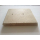 Das Bild zeigt eine Vermiculite Platte mit den Maßen 23x26x3cm. Die Platte ist plattenförmig und hat eine beigefarbene Textur mit zwei Bohrungen. Vermiculite Platten werden oft im Hochtemperaturbereich als feuerfeste Isolierung verwendet, zum Beispiel in Öfen, Kaminen und anderen Heizanlagen.